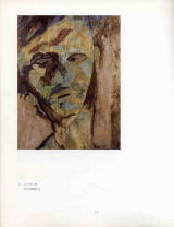 人の顔が抽象的に描かれている絵画の作品が載っている本のページの写真